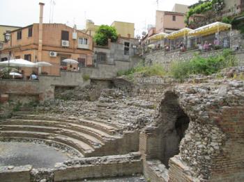 The Odeon, with a trattoria at the top — Taormina. 